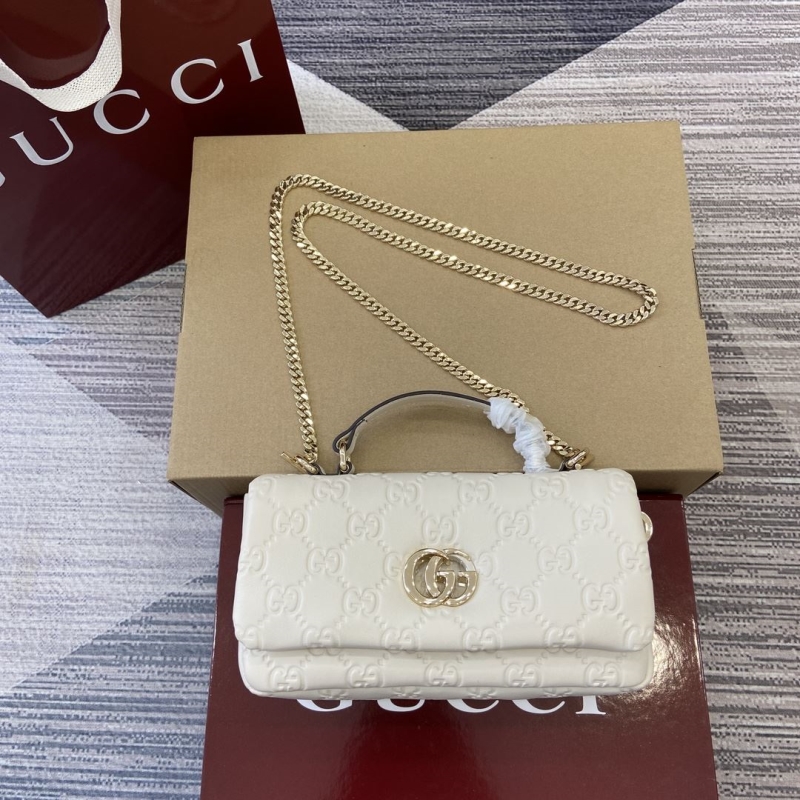 G*u*i top handle bags